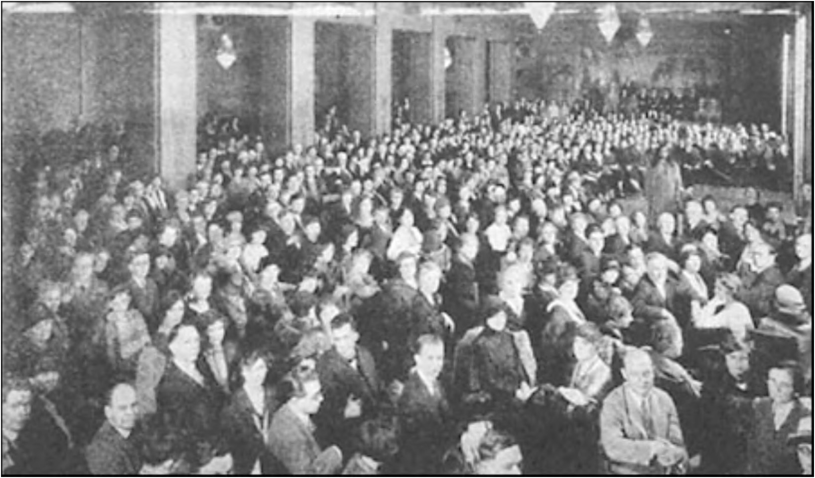 I stand on the dais before one of my classes in America. This class of a thousand yoga students was held in Washington, D.C.