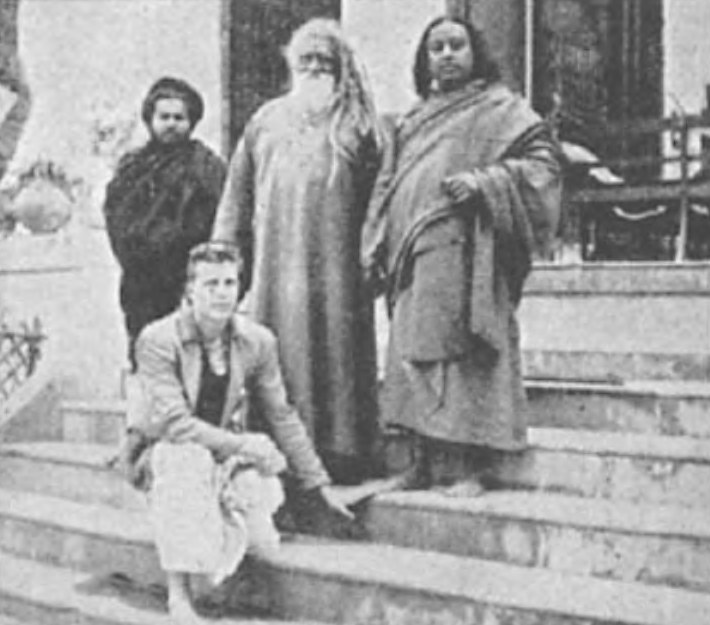 Mr. Wright and I pose with the venerable Swami Keshabananda and a disciple at the stately hermitage in Brindaban
