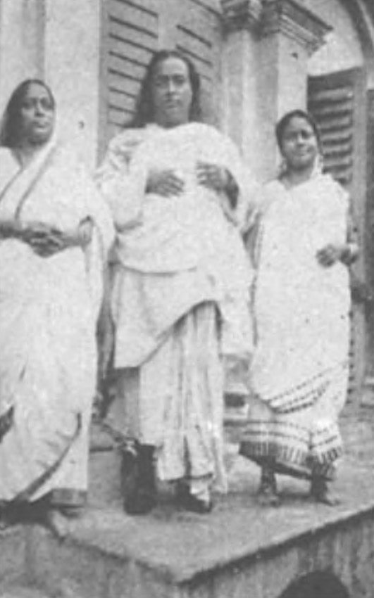 I stand with my two sisters, Roma (at left) and Nalini