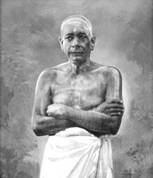 Portrait of Sivaprakasam Pillai standing bare-chested with arms folded, wearing a white dhoti.