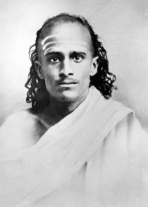 Portrait of Kavyakanta Ganapati Muni ('Nayana') with long hair and sacred ash on his forehead, a cloth over his shoulders.