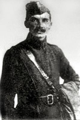 Portrait of F.H. Humphreys in a dark military-style uniform with cap and shoulder strap.