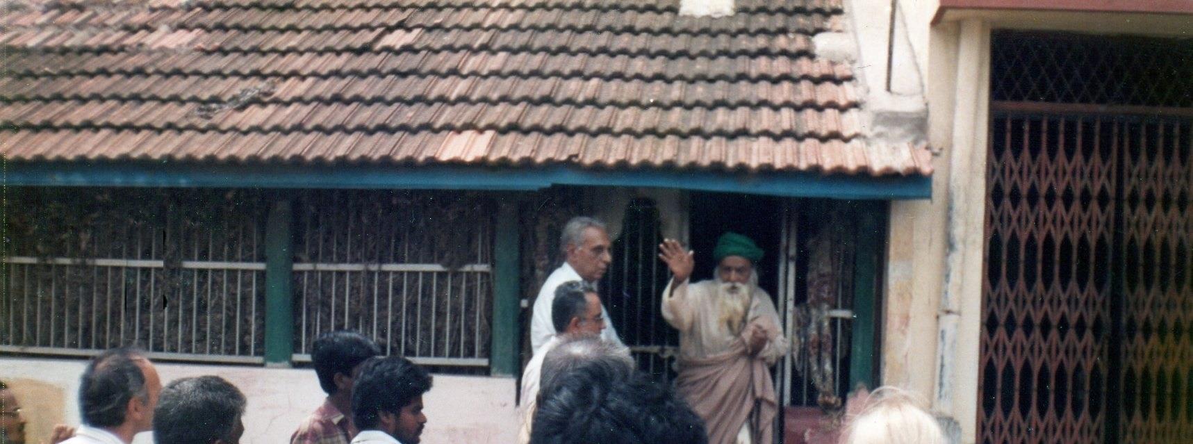 “…..Yogiji blessing devotees at the entrance to his house in Sannidhi Street…..”