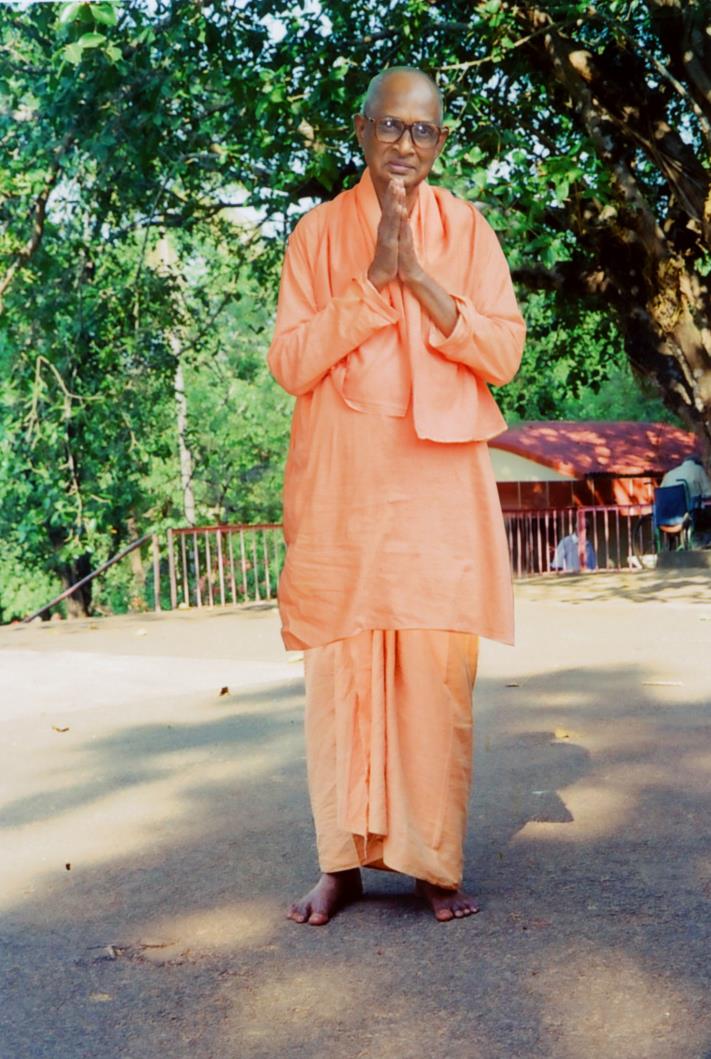 Swami Satchidananda standing beneath ‘Panchavati’