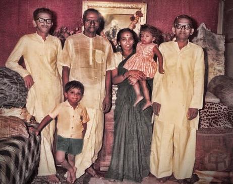 Nisargadatta Maharaj with his son Chittaranjan (right end), daughter-in-law and grand children