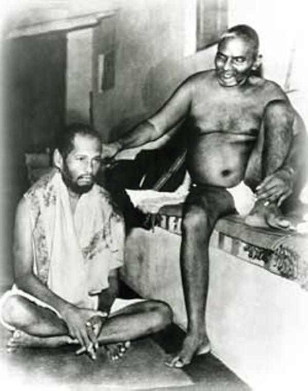 Swami Muktananda being blessed by his Guru: Swami Nithyananda