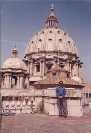 In front of the famous Dome of St.Peter’s Cathedral in Rome