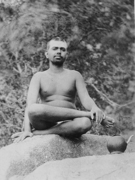 Bhagavan seated on a rock at Virupaksha Cave