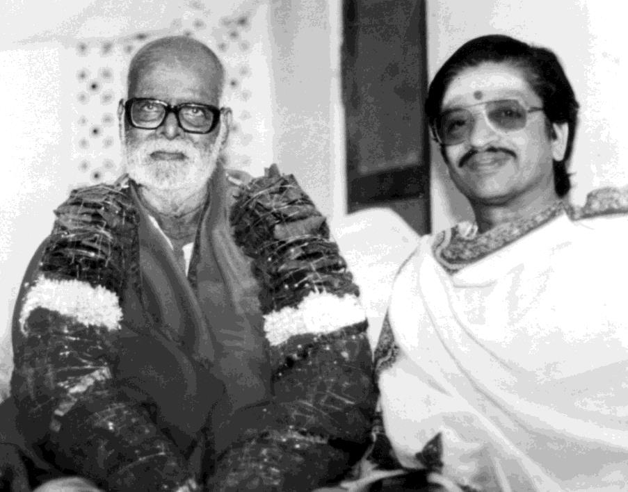 Ganesan felicitating Kunju Swami on his 90th birthday