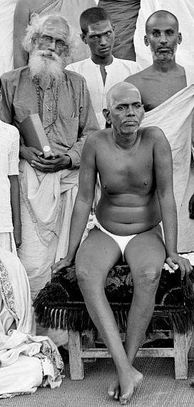 Sri Bhagavan with B.V.Narasimha Swami (holding a book)