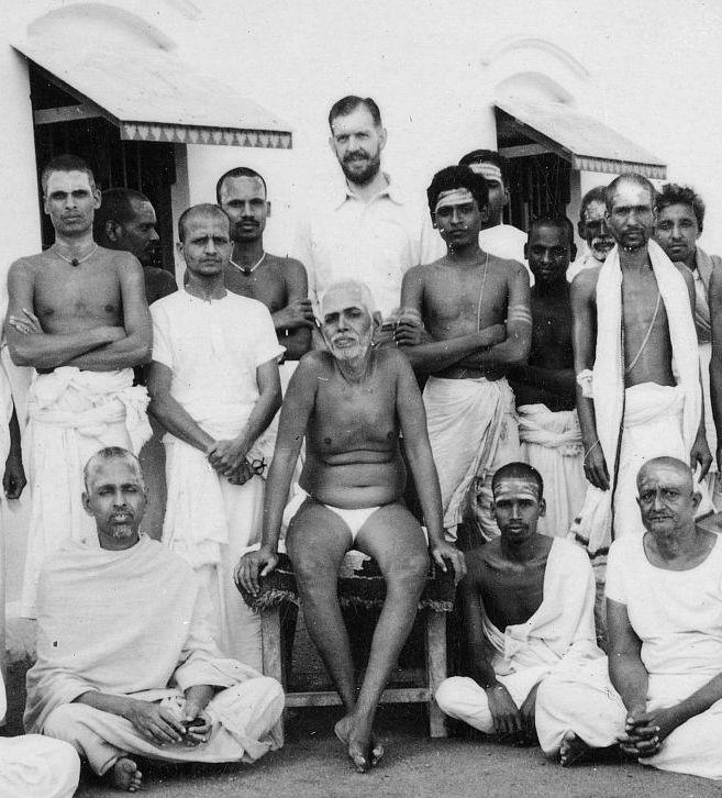Bearded Chadwick standing behind his ‘Guru’