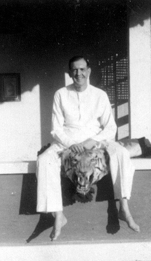 Sadhu Arunachala seated on a tiger skin