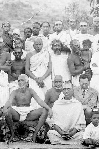 Maurice Frydman (in suit) seated on the left side of Maharshi