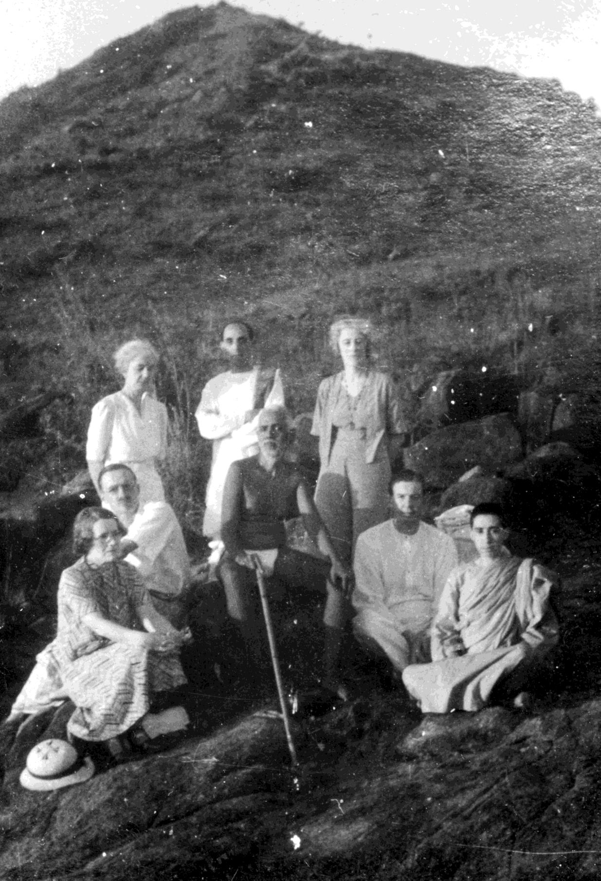 Western devotees on the Hill with Bhagavan (Cohen is standing behind Him)