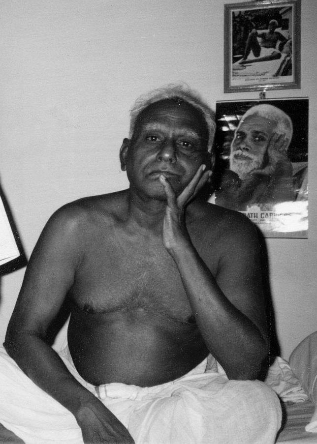 Balarama Reddiar attentively listening to visiting devotees questions