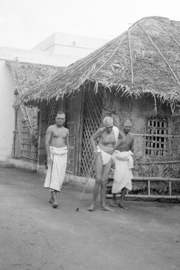 Sri Bhagavan walking towards goshala, TPR to his right