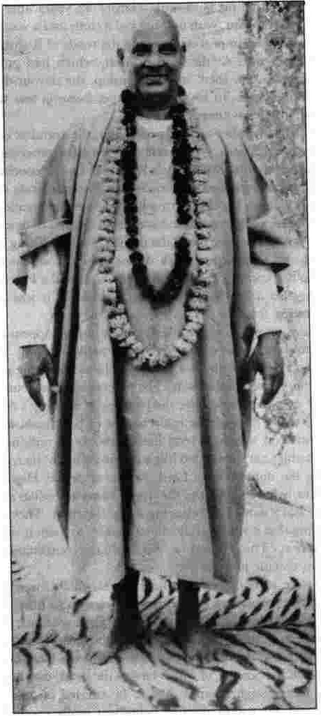 Swamiji garlanded on his birthday.