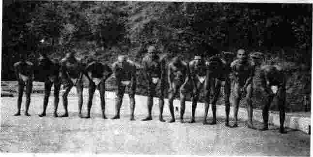 Senior swamis of the ashram demonstrate asanas
