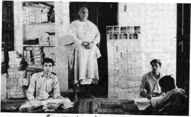 Swamiji with two of the press workers