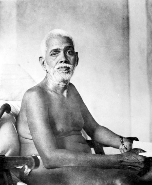 black-and-white photo of Sri Bhagavan seated in chair