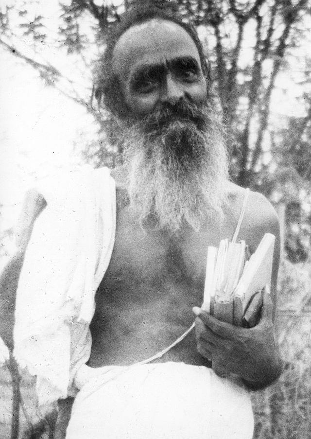 photograph: T.K. Sundaresa Iyer holding books