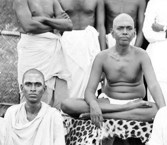 photograph, see caption (young Viswanathan at Feet of Sri Bhagavan)
