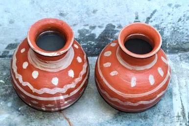 photo of two red clay pots