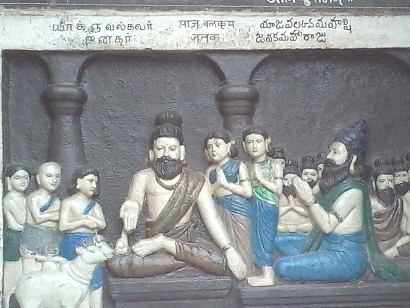 photo of relief sculpture of Yajnavalkya teaching King Janaka, with Tamil, Devanagari and Telugu labels