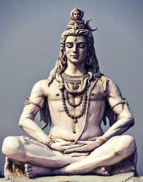 photo of a statue of Lord Siva seated in meditation