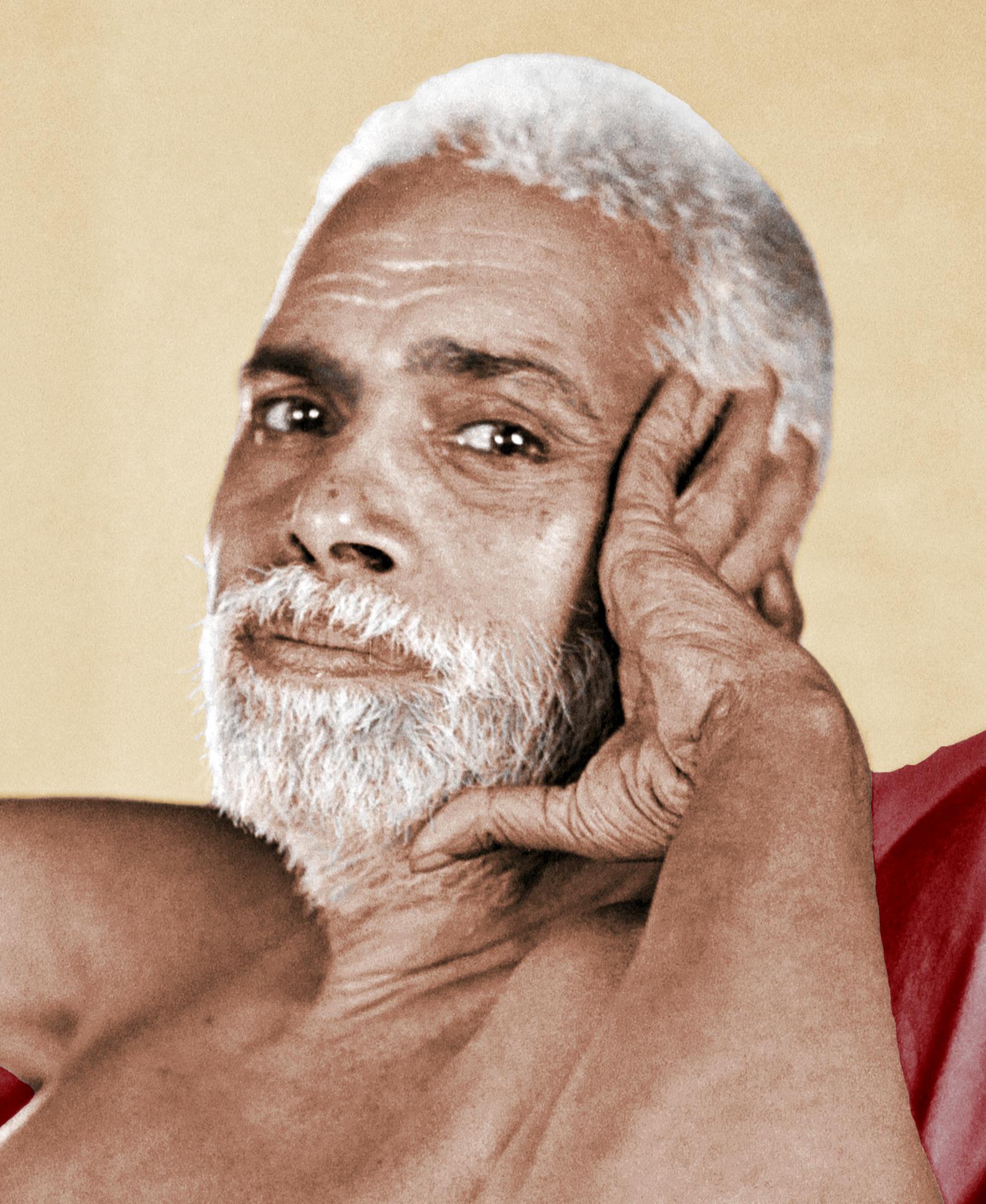colour photo of Sri Bhagavan, face resting on his hand, looking sideways