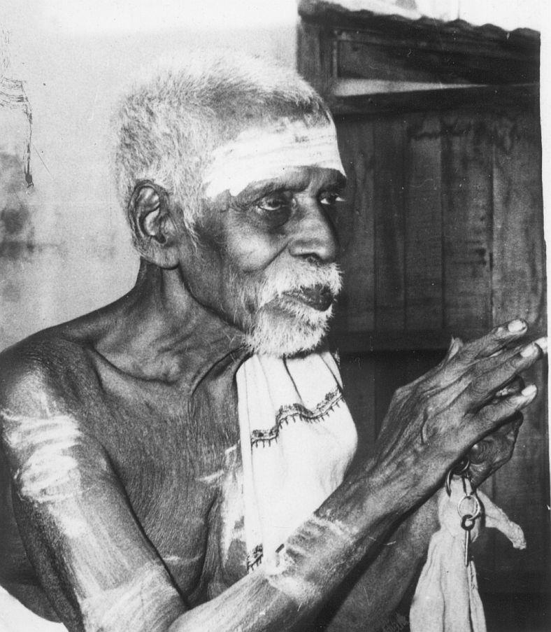 photo of Sri Venkatesa Shastri, an old man with vibhuti marks, hands raised