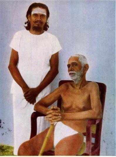 colour photo of T.N. Venkataraman standing beside seated Sri Bhagavan