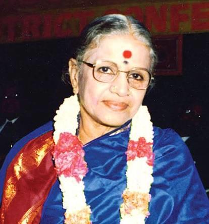 photo of M. S. Subbulakshmi, an elderly woman with garlands