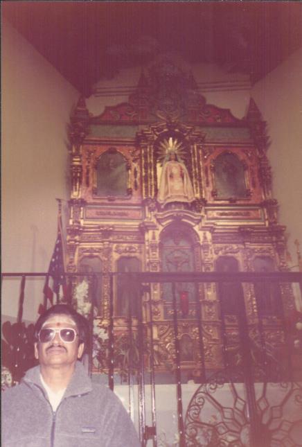 photo of ornate church altar with Ganesan in the foreground