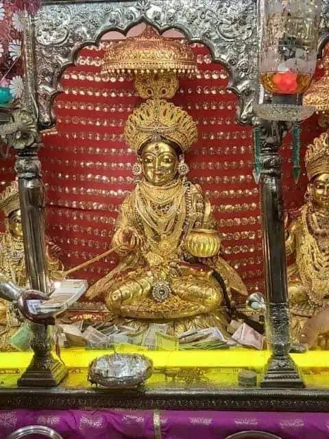 photo of the gilded image of Mother Annapoorni